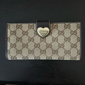 Gucci long wallet.